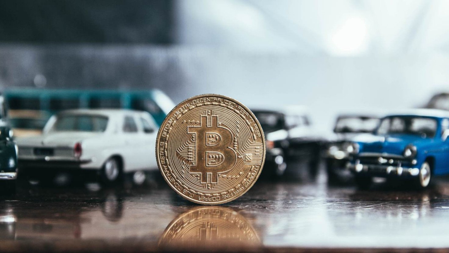 buy cars with bitcoin
